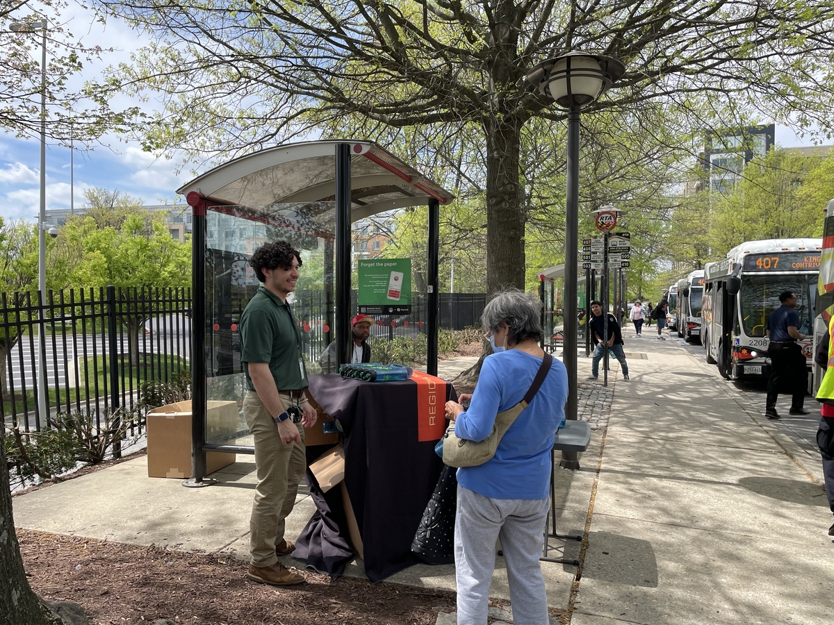 Thanking a customer at Earth Day pop up