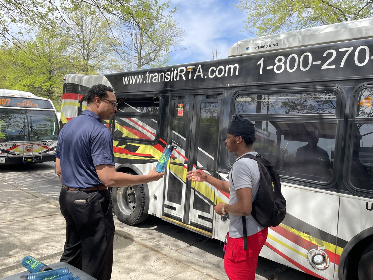 Thanking a customer at Earth Day pop up