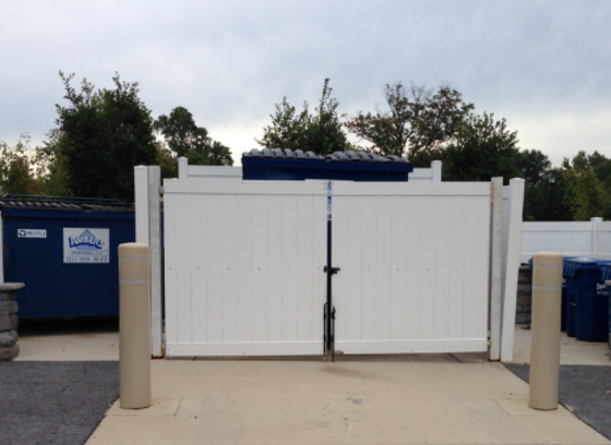 trash and recycling dumpster enclosure