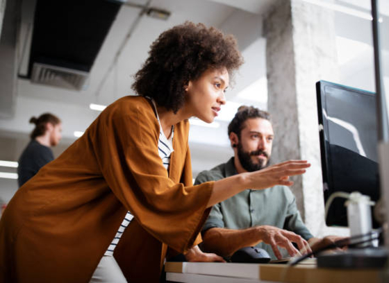 Apprenticeships for Business. Employer working with participant