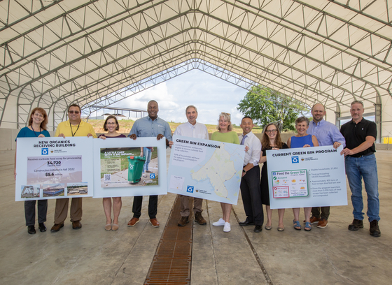 county executive ball and others in group photo under dome receiving building at composting facility