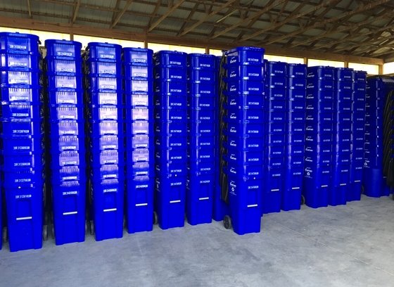 stacked recycling carts in warehouse