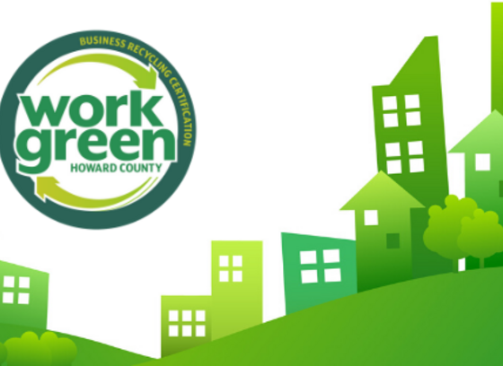 Banner for the Work Green programfeaturing green text with two light green arrows forming a circle around the words.